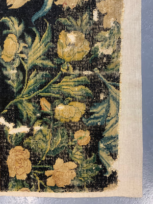 A Louis XIV Savonnerie carpet fragment (153 x 87cm)