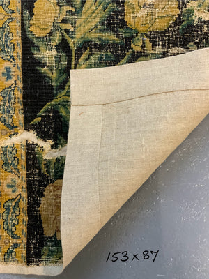 A Louis XIV Savonnerie carpet fragment (153 x 87cm)