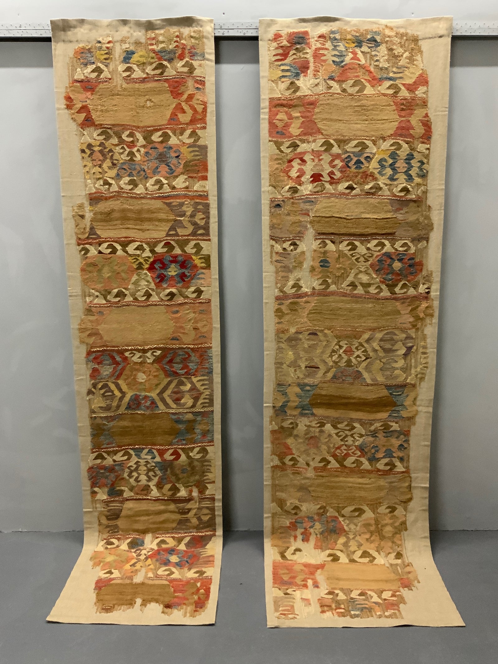 Mounted Anatolian antique kilim companion fragments (~286 x 74cm) [2]