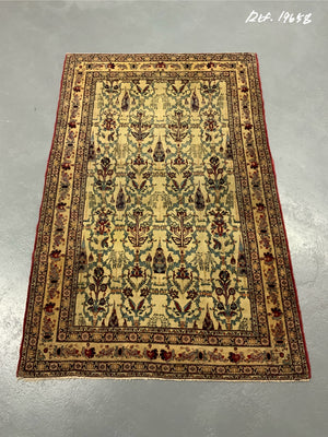 Ravar Kirman all-over design antique rug (210 x 136cm)