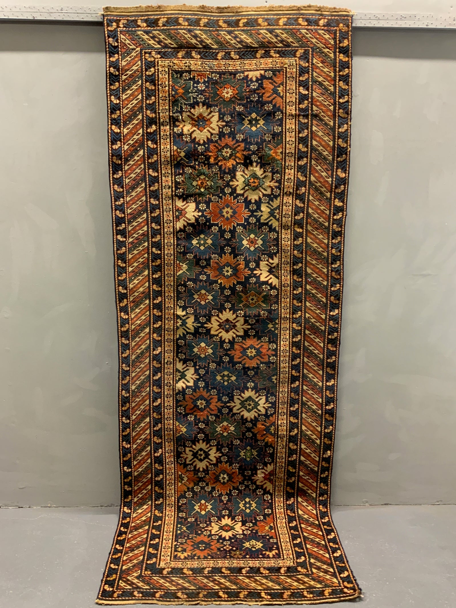 Caucasian antique Shirvan blossom type long rug (295 x 107cm)