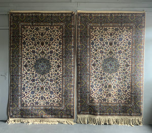 Pair of Kashan rugs with pale field (234 x 142 / 244 x 144cm)