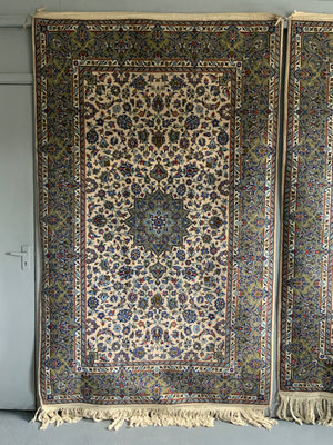 Pair of Kashan rugs with pale field (234 x 142 / 244 x 144cm)