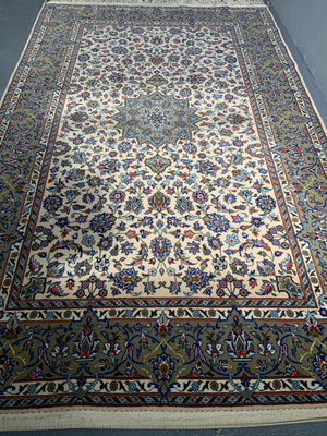 Pair of Kashan rugs with pale field (234 x 142 / 244 x 144cm)