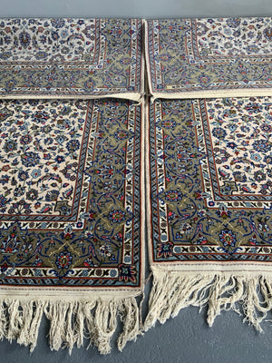 Pair of Kashan rugs with pale field (234 x 142 / 244 x 144cm)
