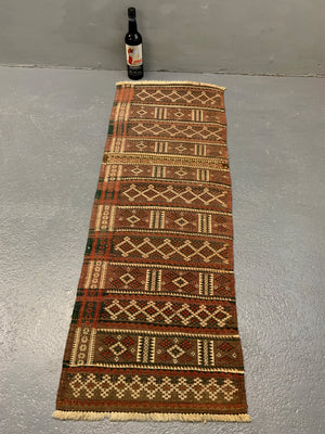 Balouch Brahui small weft float rug (142 x 36cm)