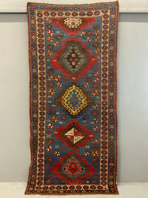 Caucasian antique Kazak rug (257 x 122cm)