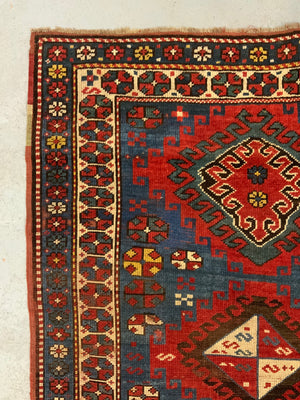 Caucasian antique Kazak rug (257 x 122cm)