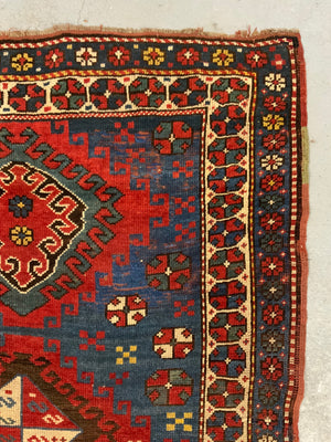 Caucasian antique Kazak rug (257 x 122cm)