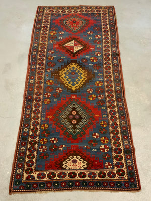 Caucasian antique Kazak rug (257 x 122cm)