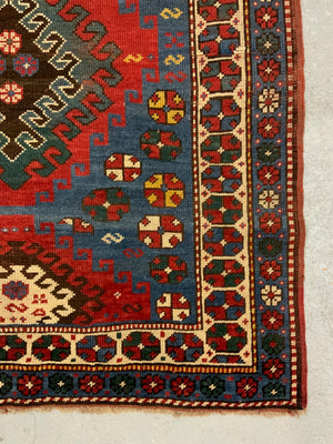 Caucasian antique Kazak rug (257 x 122cm)