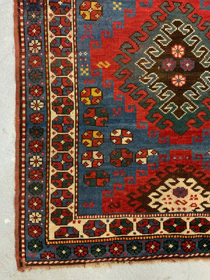 Caucasian antique Kazak rug (257 x 122cm)