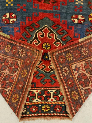 Caucasian antique Kazak rug (257 x 122cm)