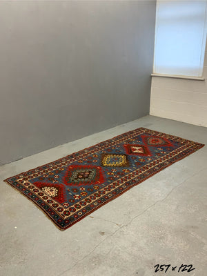 Caucasian antique Kazak rug (257 x 122cm)
