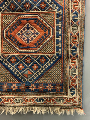 Small Turkish rug (118 x 92cm)
