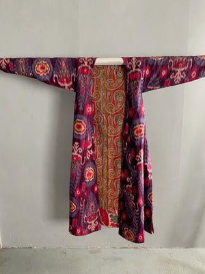 Uzbekistan antique shahin ikat robe lined with abr / abrbandi ikat