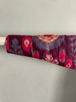 Uzbekistan antique shahin ikat robe lined with abr / abrbandi ikat