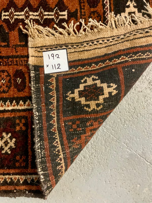 Balouch rug with a camel train (193 x 112cm)