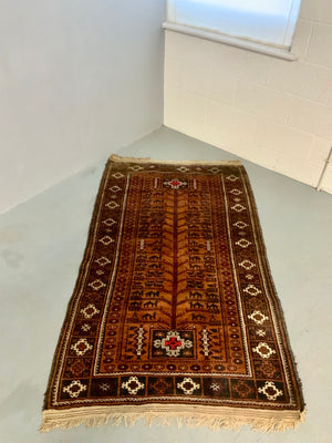 Balouch rug with a camel train (193 x 112cm)