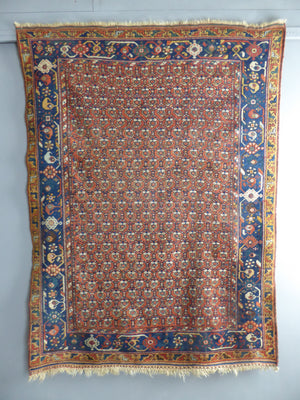 Afshar antique red / orange ground rug with lattice design (191 x 146cm)