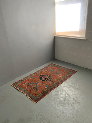 Karajah antique red ground rug (150 x 89cm)