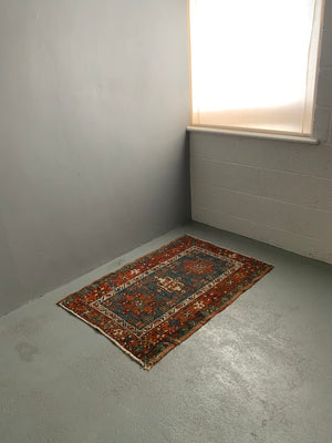 Karajah blue ground rug (122 x 81cm)