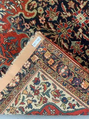 Pair of vintage Sarouk rugs (140 x 105cm)