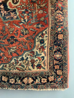 Pair of vintage Sarouk rugs (140 x 105cm)