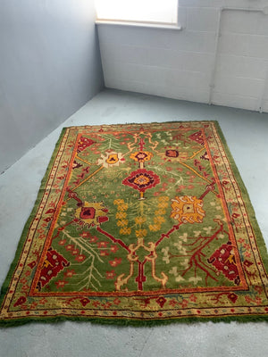 Turkish antique Edwardian Ushak cut and shut rug (219 x 179cm)