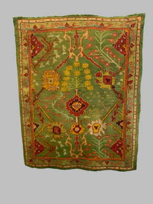 Turkish antique Edwardian Ushak cut and shut rug (219 x 179cm)