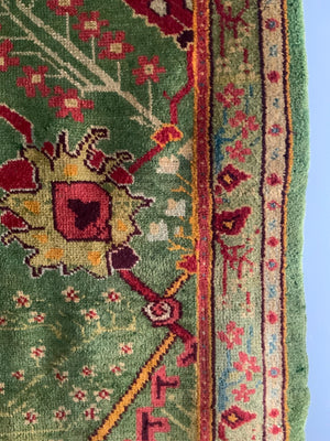 Turkish antique Edwardian Ushak cut and shut rug (219 x 179cm)