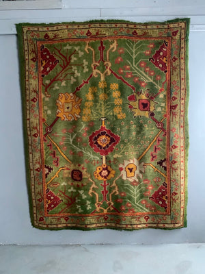 Turkish antique Edwardian Ushak cut and shut rug (219 x 179cm)