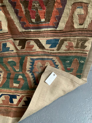 Anatolian mounted antique kilim fragment (291 x 85cm)