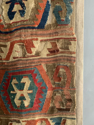 Anatolian mounted antique kilim fragment (291 x 85cm)