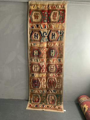 Anatolian mounted antique kilim fragment (291 x 85cm)