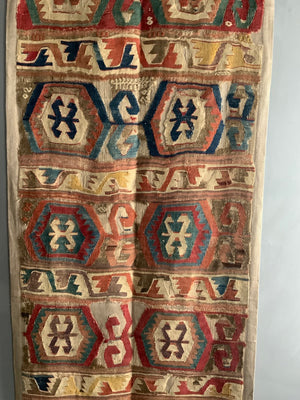 Anatolian mounted antique kilim fragment (291 x 85cm)