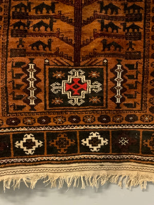 Balouch rug with a camel train (193 x 112cm)