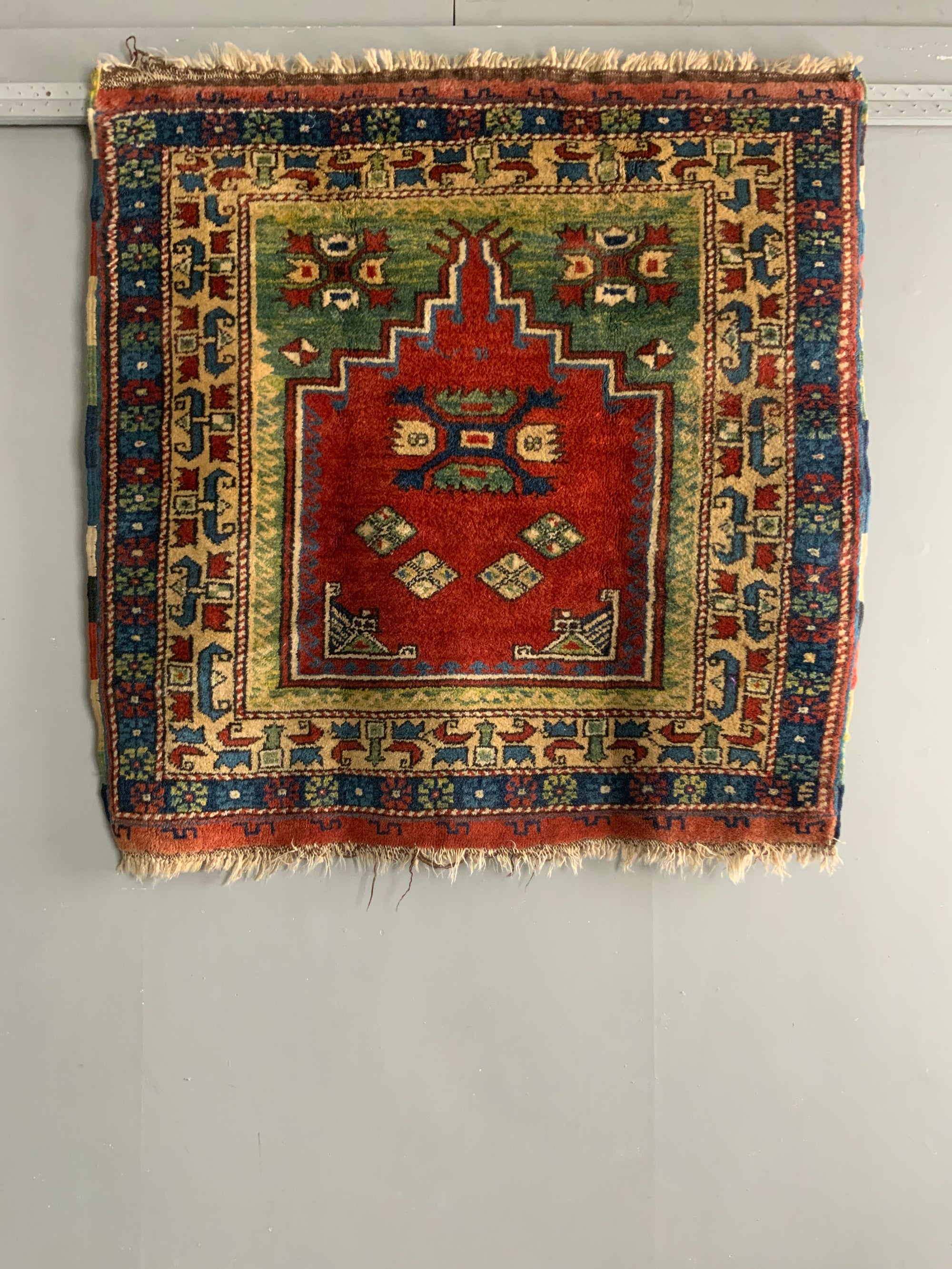 Small Turkish niched rug (123 x 122cm)