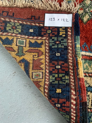 Small Turkish niched rug (123 x 122cm)