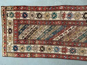 Caucasian antique long rug / runner (312 x 98cm)